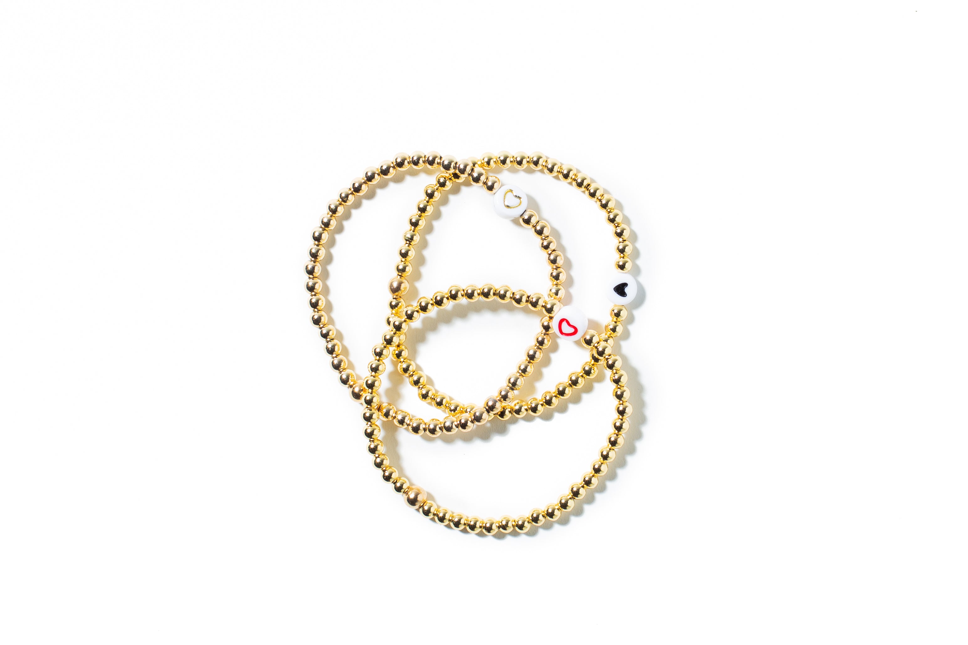 Gold Ball Black Heart Bracelet